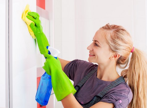 Cleaners Surrey team working safely with protective equipment